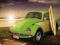 GREEN VW BEETLE WITH SURF BOARD - plakat 61x92cm