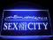 Reklama Neon Sex and the City szyld prezenter
