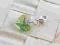 ZAWIESZKA CHARMS SWAROVSKI HEART PERIDOT AB