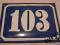Przedwojenna tabliczka emaliowana numer dom 103