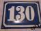 Przedwojenna tabliczka emaliowana numer dom 130