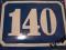 Przedwojenna tabliczka emaliowana numer dom 140