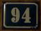 Przedwojenna tabliczka emaliowana numer dom 94