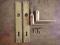 Klamki mosiężne PEŁNY ZESTAW szyldy śruby (1)