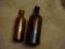 2 brązowe buteleczki d. Magister Klawe