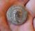 Roman srebrnej monety Antoninian
