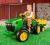 PEG PEREGO TRAKTOR JOHN DEERE 12V z PRZYCZEPĄ 2011