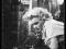 Marilyn Monroe (w oknie) - plakat  61x91,5 cm