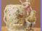 Śliczny porcelanowy wazonik z fig. dzieci cudo bcm