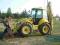 NEW HOLLAND LB 115-4PS NA RÓWNYCH KOŁACH