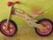 Drewniany rower biegowy dla dziewczynki