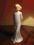 Dziewczynka z misiem- figurka porcelanowa Regal