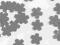 SCRAPKI KWIATY KWIATKI SZARE 1,6 CM OKAZJA 150 SZT