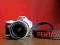 Biały Pentax K-x + 18-55mm f/3,5-5,6 AL