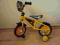 Żółty rowerek dla maluszka jak nowy
