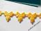 KWIATOWE KOKARDKI  /10szt/ żółte KT-07