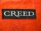 naszywka CREED 10,5cm x 3cm NOWA