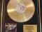 MOTLEY CRUE gold LP CARNIVAL OF SINS display