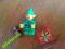 LEGO MINIFIGURES elf z paczką świąteczną i misiem