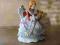 Figurka siedząca dama porcelana ręczna praca