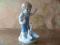 Figurka chłopiec karmiący gęsi kaczki porcelana