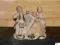 UROCZA FIGURKA PORCELANOWA SYGNOWANA