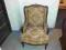 fotel z cwiekowanymi bokami bardzo stary