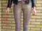 Spodnie rurki jeansy skóra węża złote wężowe r.36