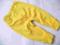 Chalk żółte dzianiowe legginsy mankiety guziki 86+