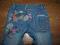 Spodnie jeans Next haftowane kwiaty 5lat (110cm)