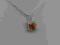 Urokliwy mały wisiorek - czerwona cyrkonia +GRATIS