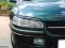 Brewki Rzęsy Opel Omega B Lampy Spoiler
