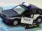 POLONEZ CARO PLUS POLICJA 1:34 WELLY