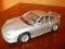 Model BURAGO PORSCHE CARRERA 911 1997r skala 1:24