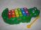 FISHER PRICE KOLOROWE GRAJACE CYMBALKI KROKODYL