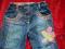 NEXT SPODENKI CIEŃKI JEANS  KWIATEK 4-5 Y r.110