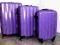walizka na kółkach . poliwęglan . fiolet . duża