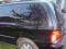 kia carnival II 02-04 szyba tylna lewa czarna