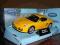 PORSCHE CAYMAN S ŻÓŁTE  WELLY 1:34