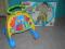 Fisher Price MUZYCZNY CHODZIK- PCHACZ Z PIANINKIEM