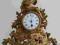 Zegar kominkowy wystylizowany na późny barok antyk