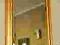 Stylizowane złote lustro w drewnianej ramie 132x52