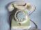 Stary telefon w kolorze ecru - W 49