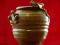 zachwycający,ceramiczny wazon zdobiony figuralnie