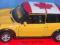 Welly Mini Cooper żółty, dach flaga Kanada 1:34