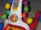Chodzik, pchacz Fisher Price.
