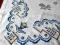 Bogato Haftowany obrus w pięknych błękitach