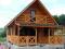 dom z drewna mieszkalny ocieplony całoroczny taras