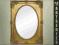 OWALNE LUSTRO STYLIZOWANE W ZŁOTEJ RAMIE