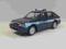 Polonez Caro policja model Welly 1:43 zabawka auto